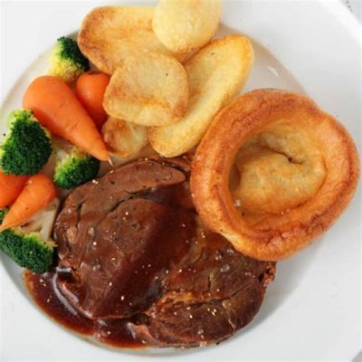   Le Yorkshire Pudding! Un délice moelleux rôti à la perfection avec une sauce au jus riche et savoureuse